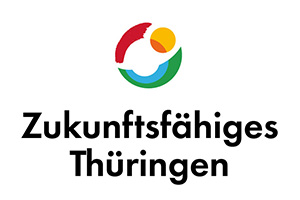 Logo mit einem kreisförmigen, abstrakten Muster in Rot, Gelb, Blau und Grün über dem deutschen Text "Zukunftsfähiges Thüringen" auf weißem Hintergrund.