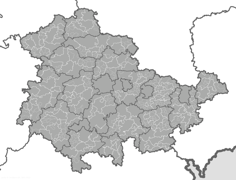 Karte einer Region, die in mehrere Verwaltungsbezirke unterteilt ist, die jeweils mit dünnen weißen Rändern auf grauem Hintergrund umrandet sind. Es sind keine Beschriftungen oder Farbvarianten vorhanden.